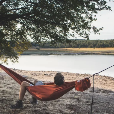 Napping in a hammock by Lake Naussac