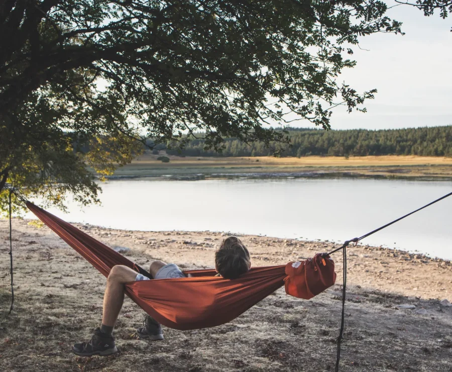 Napping in a hammock by Lake Naussac